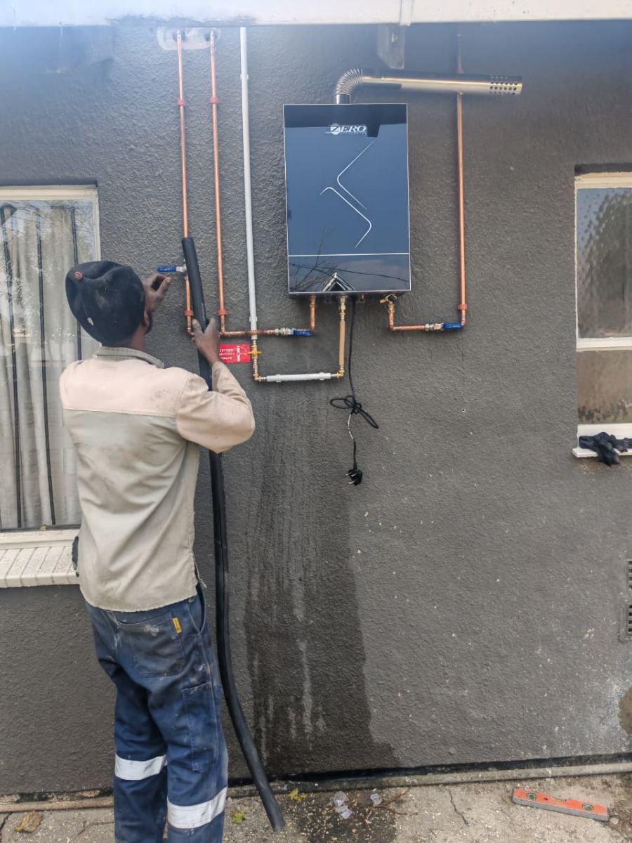 The Plumbline plumber installing a gas geyser in Pretoria