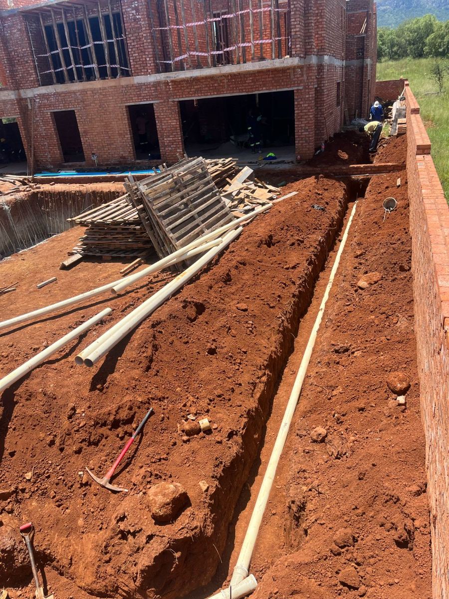 Site trenching with PVC pipes ready for connection